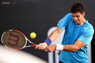 Two-time champ Thomaz Bellucci wins 1st match at Swiss Open