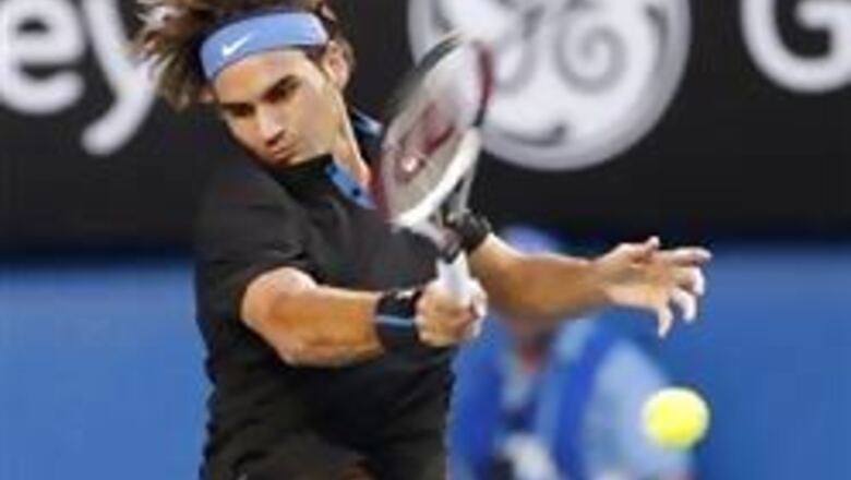 Federer breezes past Blake to reach semis