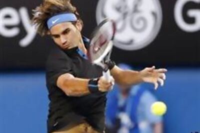 Federer breezes past Blake to reach semis