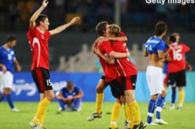World Champion Italy knocked out by 10-man Belgium