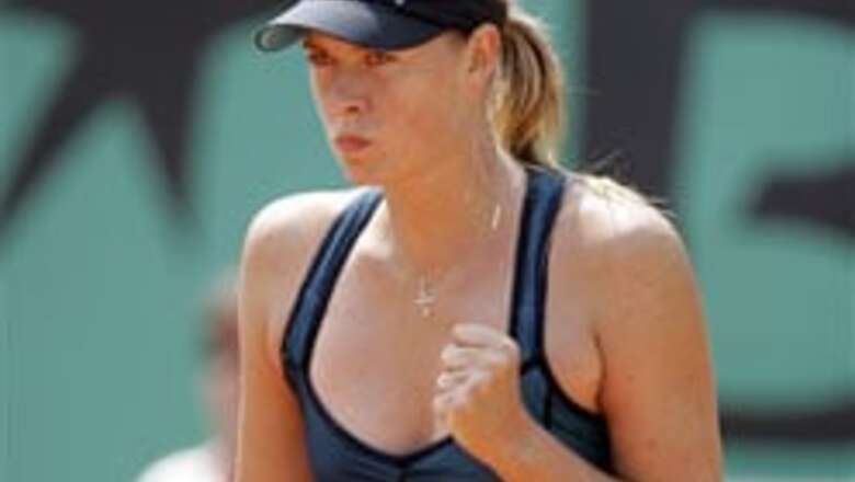 Henin, Sharapova storm into semis