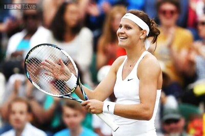 Lucie Safarova first player through to Wimbledon quarter-finals