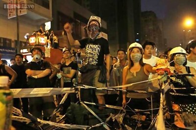 Hong Kong protesters stage massive, defiant rally