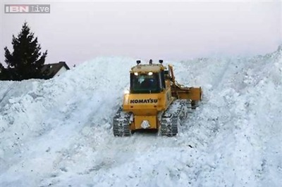 US: With snow still piled high, Buffalo faces flooding