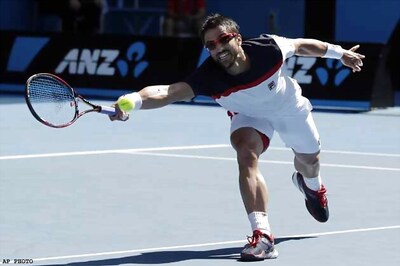 Almagro reaches quarters after Tipsarevic retires