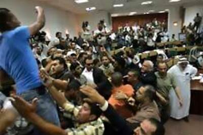 Workers storm Palestinian Parliament