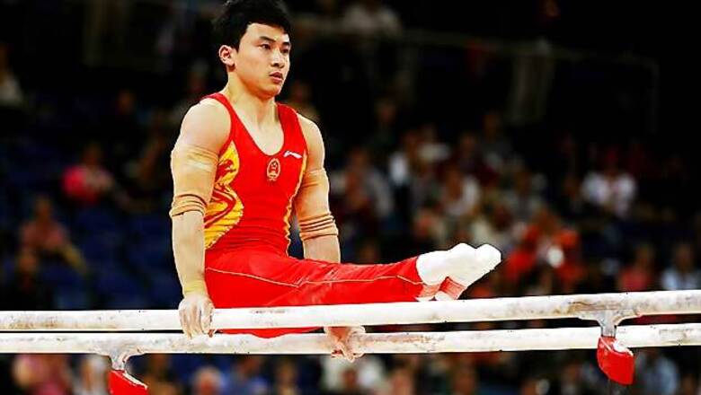 Olympics: China's Zhe wins gold in parallel bars