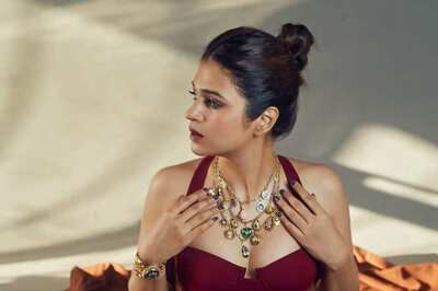 Shraddha Das Steals The Show In Sultry Wine Corset And Pleated Skirt