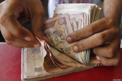 Rupee opens at 60.24 per dollar, down 11 paise