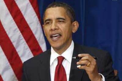 Obama signs $787 bn economic stimulus bill into law