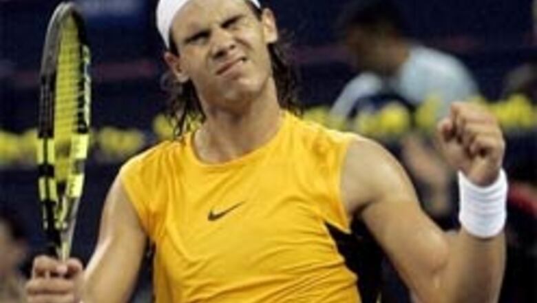Nadal wins, Blake moves into semis