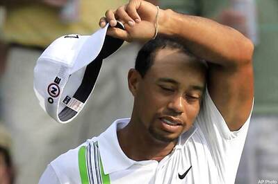 Honda Classic: Late surge saves Woods from cut