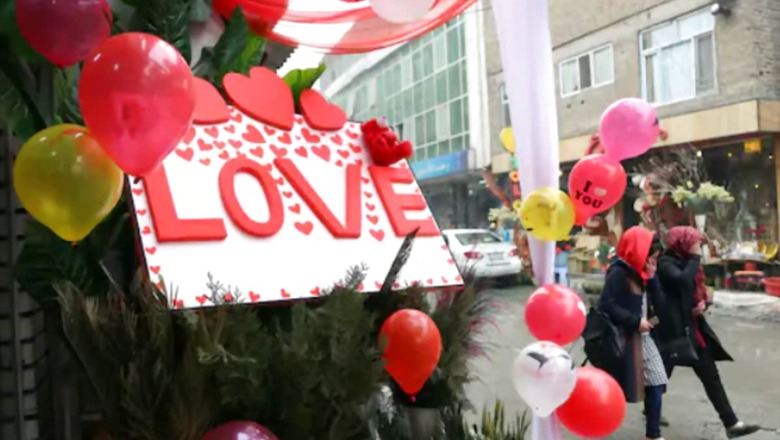 A Bleak Valentine's Day, Lovers Find Hope in Roses, Vaccines